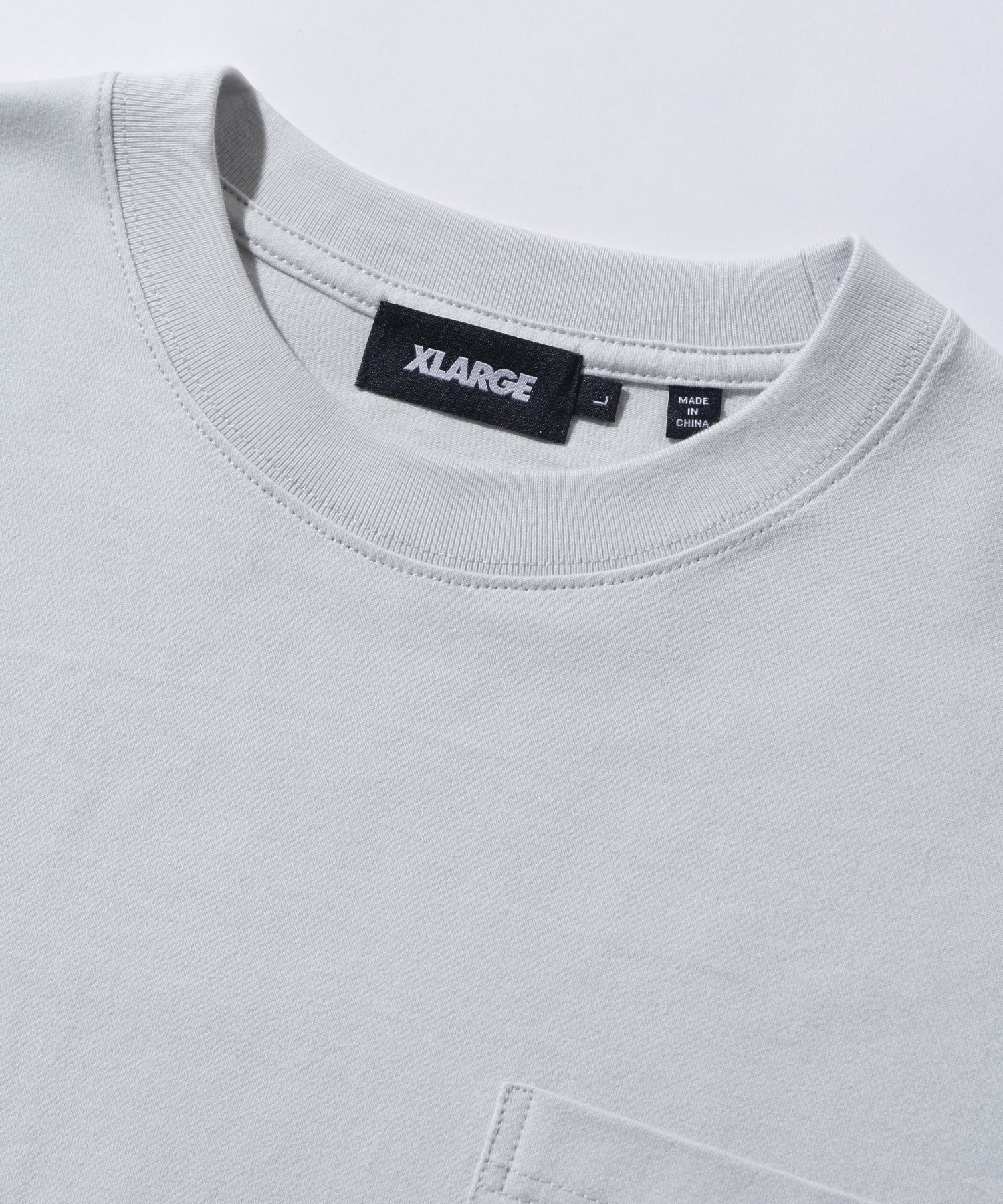 เสื้อยืดแขนสั้น XLARGE รุ่น HANG OUT S/S POCKET TEE