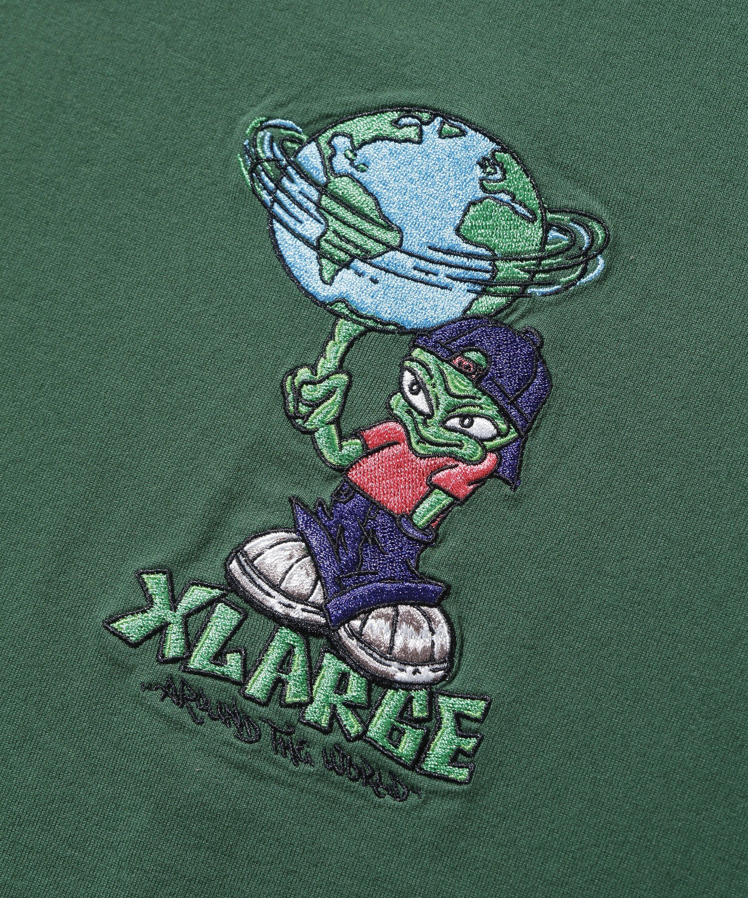 เสื้อยืดแขนสั้น XLARGE รุ่น AROUND THE WORLD LOGO S/S TEE