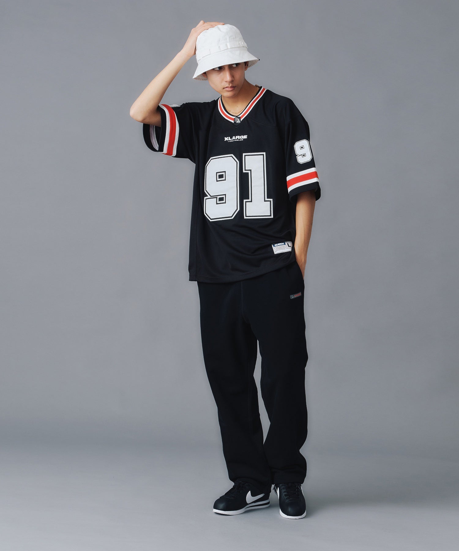 เสื้อยืดแขนสั้น XLARGE รุ่น PANELED FOOTBALL JERSEY